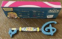 Key and box sleeve showing the collectible key and the series on the box.