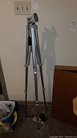 Side view of Vivitar 1240 tripod standing at approximately 51 inches.