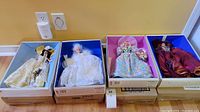 Full set of 4 Barbie dolls in original boxes representing the seasons Spring, Summer, Autumn, and Winter.