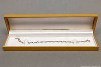 Full-length bracelet in gold-tone presentation box