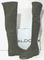 Pair of brand-new green ALDO Elinna textile boots standing upright with ALDO box behind them