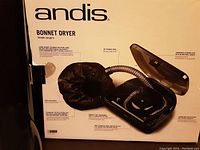 Box of Andis Bonnet Dryer showing branding and features description, including jumbo bonnet, ionic technology, and 2 speed and heat settings
