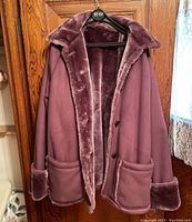 Faux fur lined dusty rose women's coat, front view with pockets and collar visible