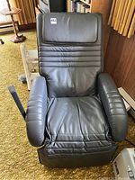 Front view of black recliner with tag visible
