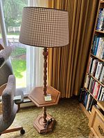 Full view of the assembled wood floor lamp with gingham fabric lampshade and built-in hexagonal shelf.