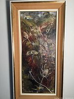 Full view of framed oil painting depicting a hillside landscape with wildflowers and a small white house, signed by Muriel Campbell.