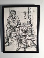 Full view of framed lithograph of seated man, stove and dog in black and white