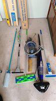 Cleaning tools including mops, scrub brush, vacuum