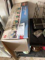 Photo of the Bissell Spot Lifter box showing the product information, features, and packaging.