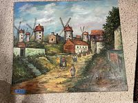 Full front view of unframed canvas painting showing village with windmills and figures