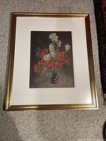 Full front view of framed artwork on carpet surface.