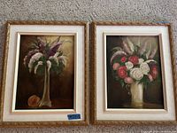 Both paintings side by side, full front view