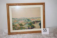 Framed watercolor painting showing an expansive landscape of the Schuylkill River and surrounding countryside with trees and fields.