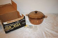 Visions amber glass covered saucepot with original box and papers