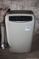 Front view showing air outlet grille and housing