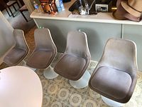 Front angle view of all four chairs lined up