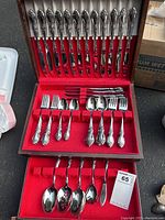 Full set in red felt-lined wooden chest