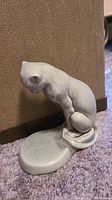 Front side of the vintage grey ceramic cat showing the cat figure and the oval base with recessed planter space at the front.