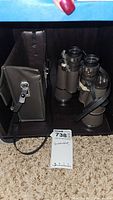 Jason Model 136 binoculars next to the carrying case and a lot tag showing item number 738.