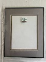 Front view of the metal picture frame showing the mat and opening.