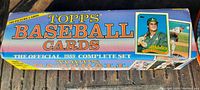 Box top featuring 'Topps Baseball Cards' logo and player image of John Canseco.