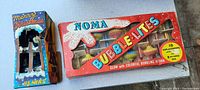 Photo of Noma Bubble Lights set in original box next to the 6-inch blinking Christmas tree box