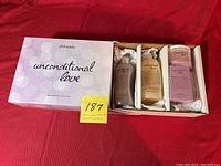 Full lot including gift box and four bottles of body care products