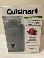 Front view of the Cuisinart ice cream maker box with product image and key features highlighting 2 quart capacity, fully automatic, brushed metal finish, and BPA free.
