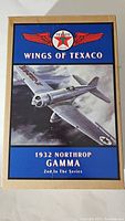 Front view of the Wings of Texaco 1932 Northrop Gamma model kit box featuring the plane illustration and Texaco logo.