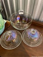 Collection of clear Bohemian crystal including one large salad bowl and two smaller covered butter/cheese plates.