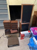 Overview of all items: RCA DVD box, Strauss 8-track player, Dual turntable, two pairs of speakers