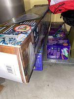 Photo showing two Swiffer WetJet mop boxes, one visible unopened