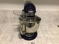 Front view of navy mixer installed with bowl and pouring shield