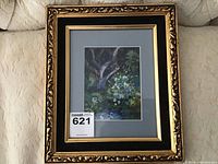 Full view of pastel artwork 'Wooded Area #325' in an ornate gold wooden frame with blue-gray matte border.