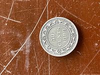 Reverse side of the coin showing 50 CENTS 1898 with decorative border.