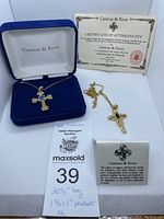 Two cross pendants with chains, boxes, certificate of authenticity and information cards