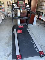 Full view of the Sole F80 treadmill in garage