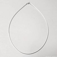 Full view of the closed 16 inch silver snake chain necklace, showcasing the overall shape and length.