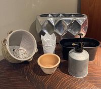 All 6 items visible from front angle on brown wood surface, showing size and shapes