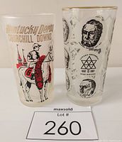Photo showing both the 1962 Kentucky Derby glass with depiction of jockey and horse with rose garland alongside the 1967 Canada Centennial Prime Ministers glass showing portraits of Canadian Prime Ministers and memorial emblem.