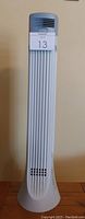 Full view of the electrostatic air cleaner showing tall vertical design and vents.