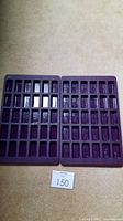 Two purple silicone petite bar molds, each with 30 small rectangular cavities, placed side by side on a beige surface.