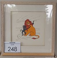 Framed serigraph artwork featuring characters Mufasa and Rafiki from The Lion King, measuring 11 x 11 inches.