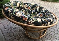 Front three-quarter view of the complete chair with cushion in place