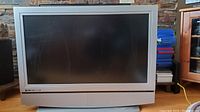 Front view of Olevia 37-inch LCD monitor with silver bezel and stand.