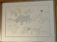 Full view of framed drawing showing composition of hunter, muskox and dogs