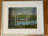 Framed view of the lakeside landscape oil painting showing 3 white birch trees, lake, red canoe, dock, and autumn foliage.