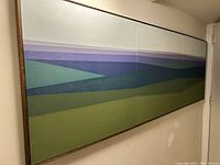 Angled view of full triptych showing side perspective