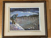 Framed pastel art depicting an elderly man feeding ducks by a river with a snowy wooded background.