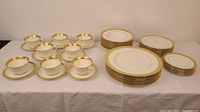 Full set: teacups with saucers, dinner plates, bowls, side plates
